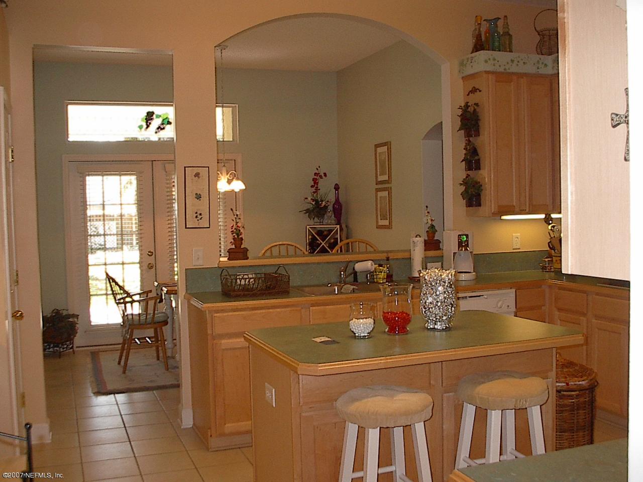 11382 Mandarin Ridge Lane Jacksonville, FL 32258 - Photo 7 of 23 a kitchen with a sink and cabinets