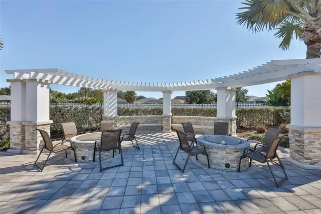 a view of a balcony with wooden floor