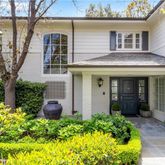 a view of a building with a swimming pool