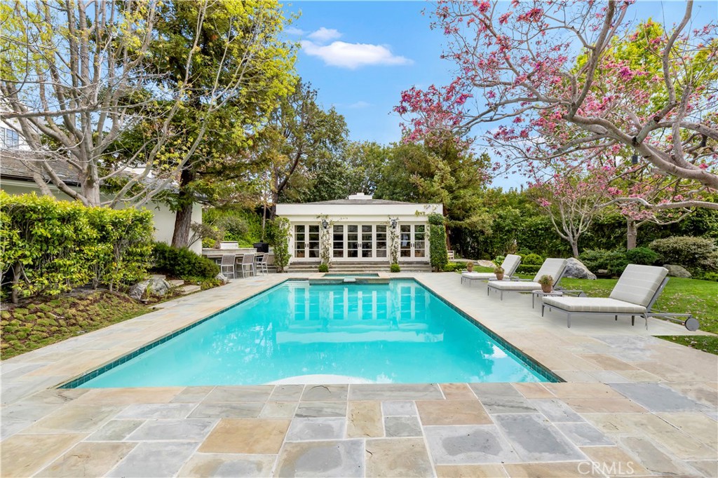 27 Burning Tree Circle Newport Beach, CA 92660 - Photo 11 of 50 a view of a house with swimming pool and sitting area