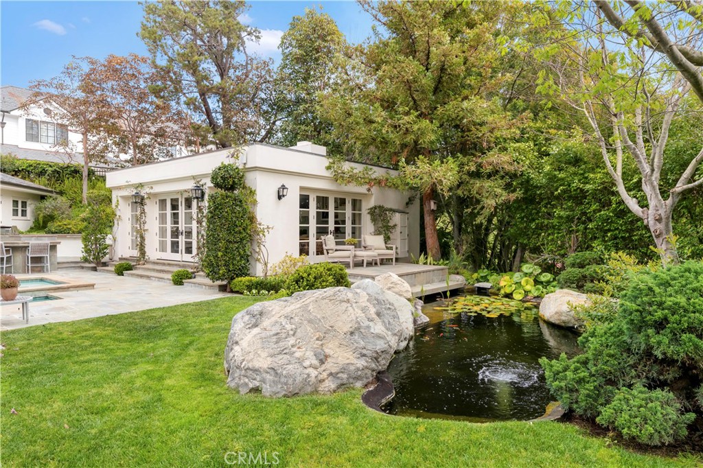 27 Burning Tree Circle Newport Beach, CA 92660 - Photo 12 of 50 a view of a house with backyard and sitting area