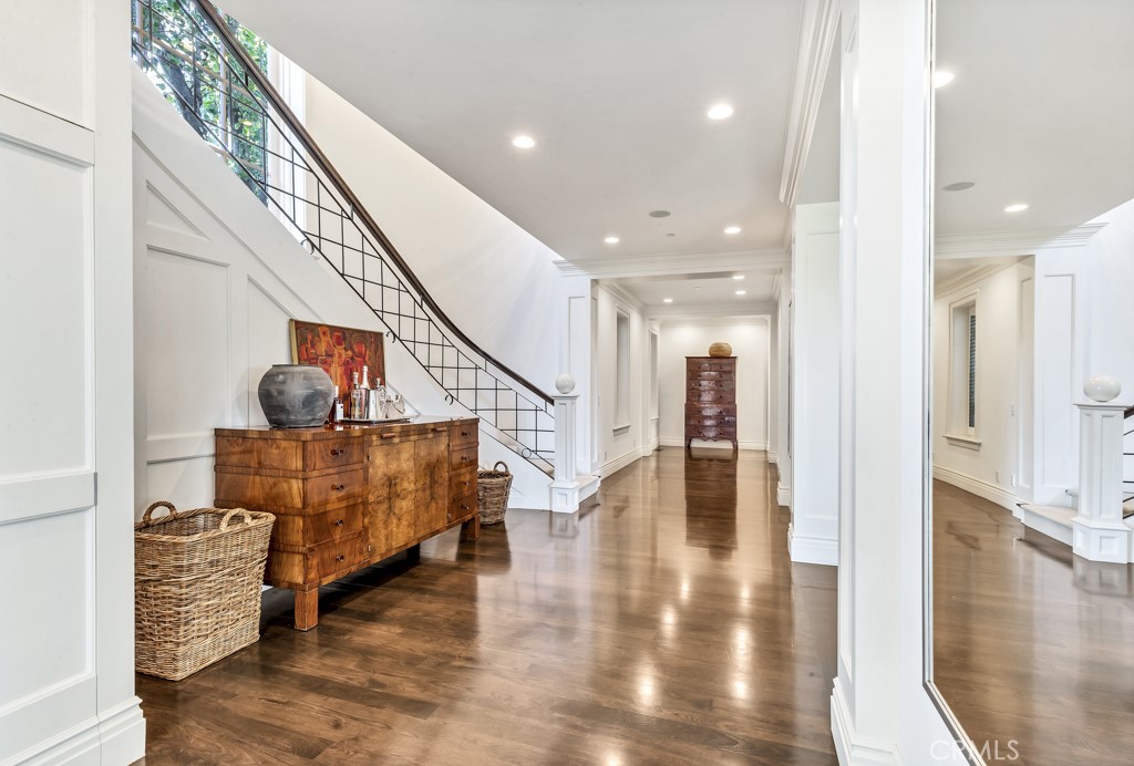27 Burning Tree Circle Newport Beach, CA 92660 - Photo 16 of 50 a view of entryway and hall with wooden floor