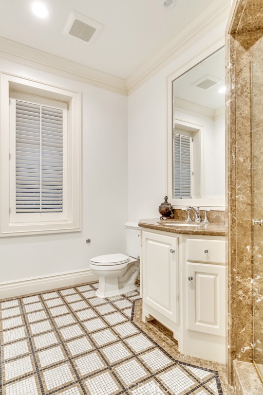 27 Burning Tree Circle Newport Beach, CA 92660 - Photo 29 of 50 a bathroom with a sink toilet and mirror