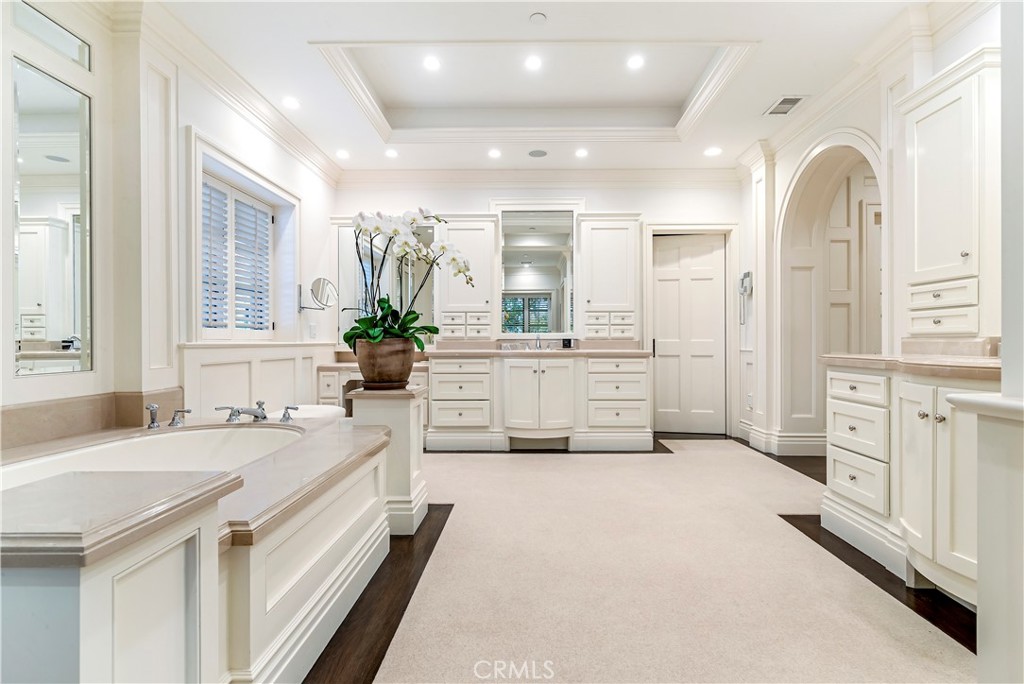 27 Burning Tree Circle Newport Beach, CA 92660 - Photo 36 of 50 a bathroom with a double vanity sink mirror and