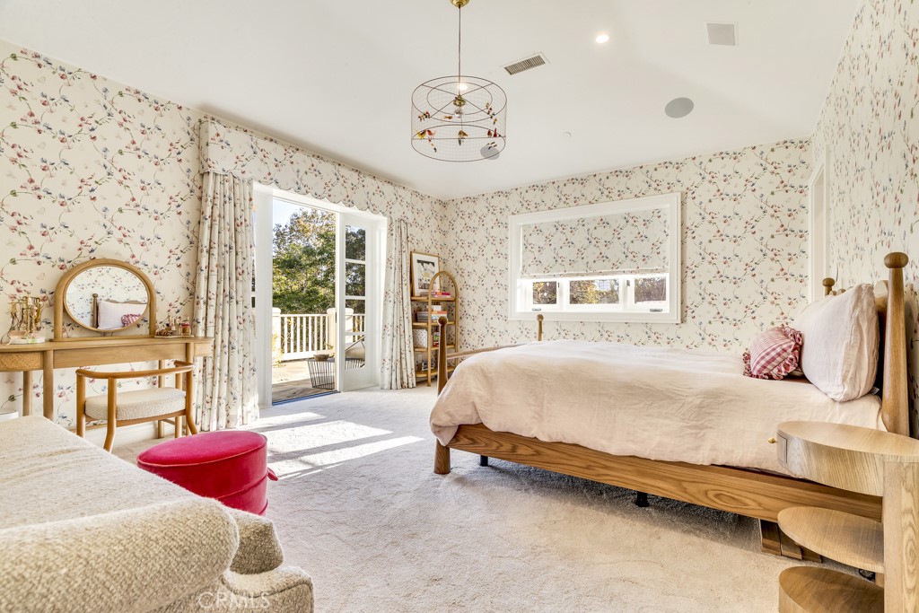 27 Burning Tree Circle Newport Beach, CA 92660 - Photo 40 of 50 a bedroom with a bed and a window