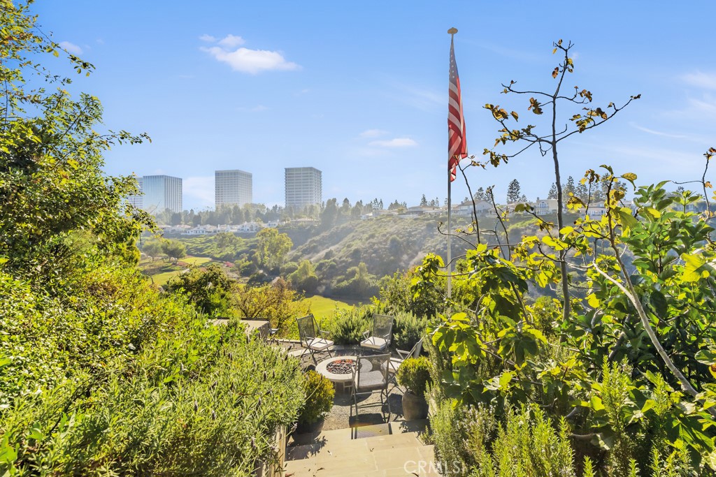 27 Burning Tree Circle Newport Beach, CA 92660 - Photo 48 of 50 a view of a patio with swimming pool