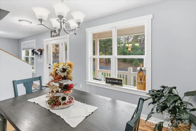 a kitchen with granite countertop a stove sink and cabinets