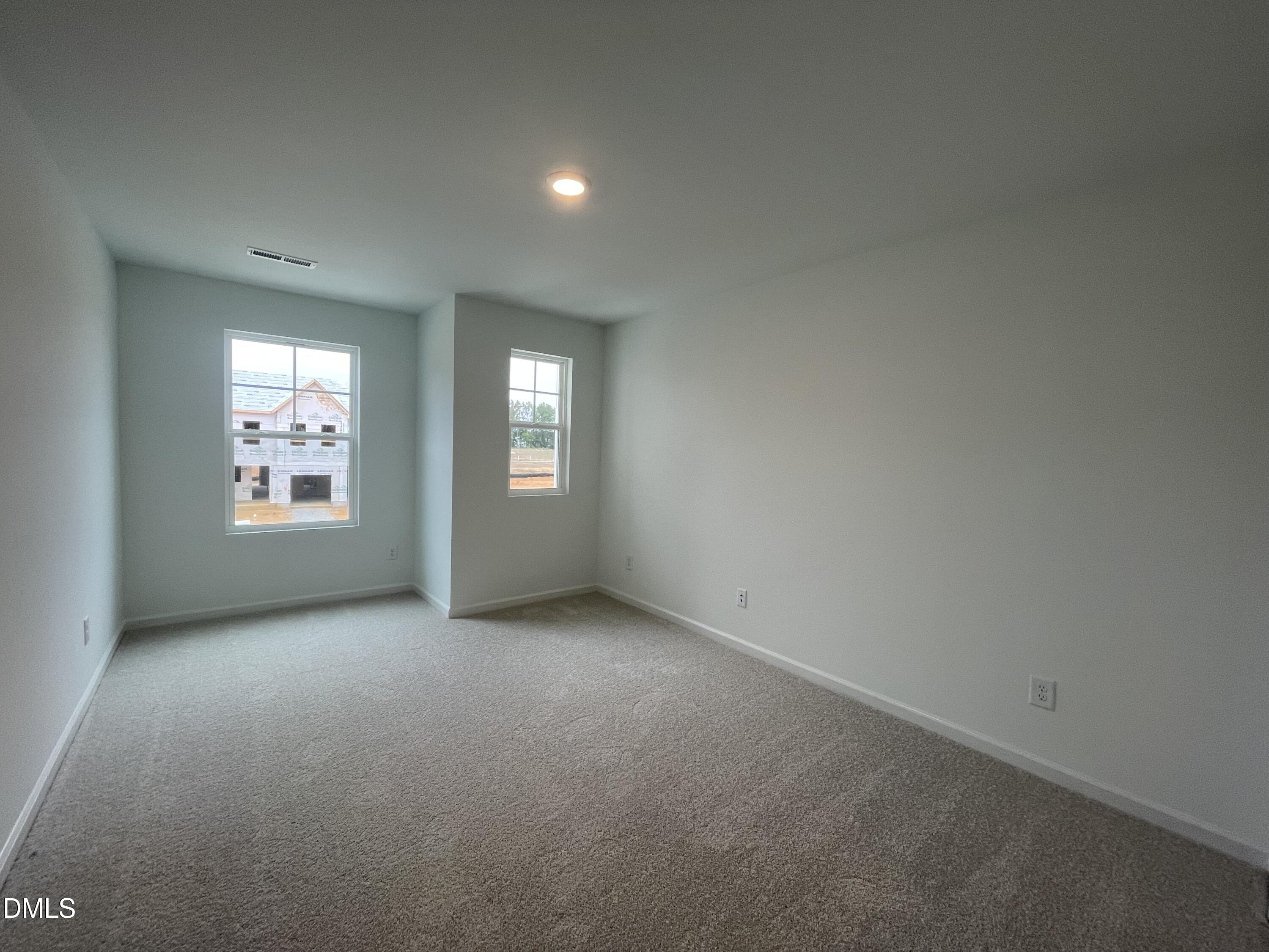 236 Lily Patch Lane Smithfield, NC 27577 - Photo 15 of 46 an empty room with windows