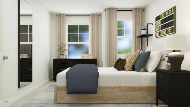 a bedroom with bed and window