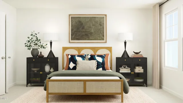 a bed room with a bed and a painting on the wall