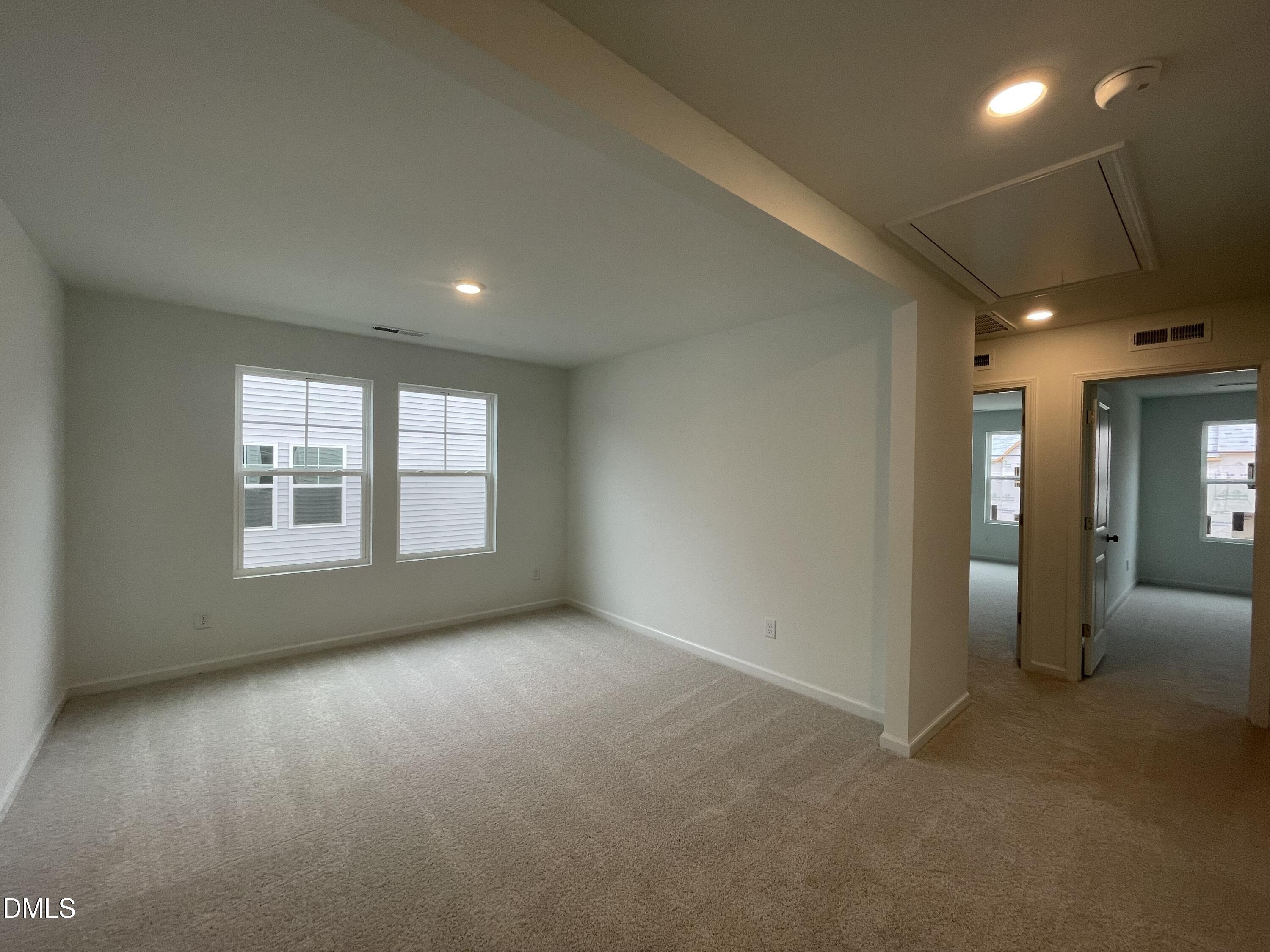 236 Lily Patch Lane Smithfield, NC 27577 - Photo 9 of 46 a view of an empty room with a window