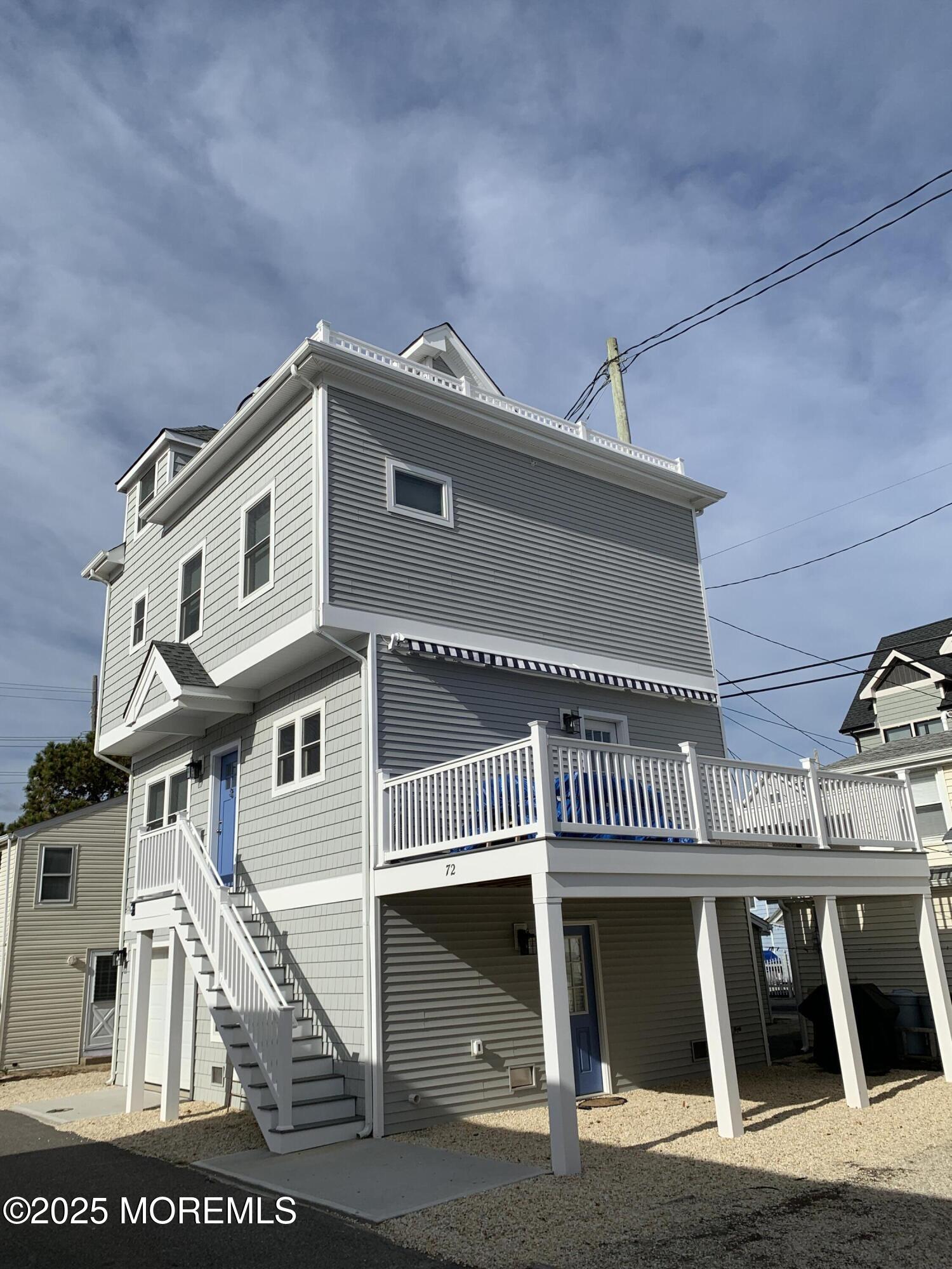 72 Spray Way Lavallette, NJ 08735 - Photo 14 of 14 a view of a house with a stairs