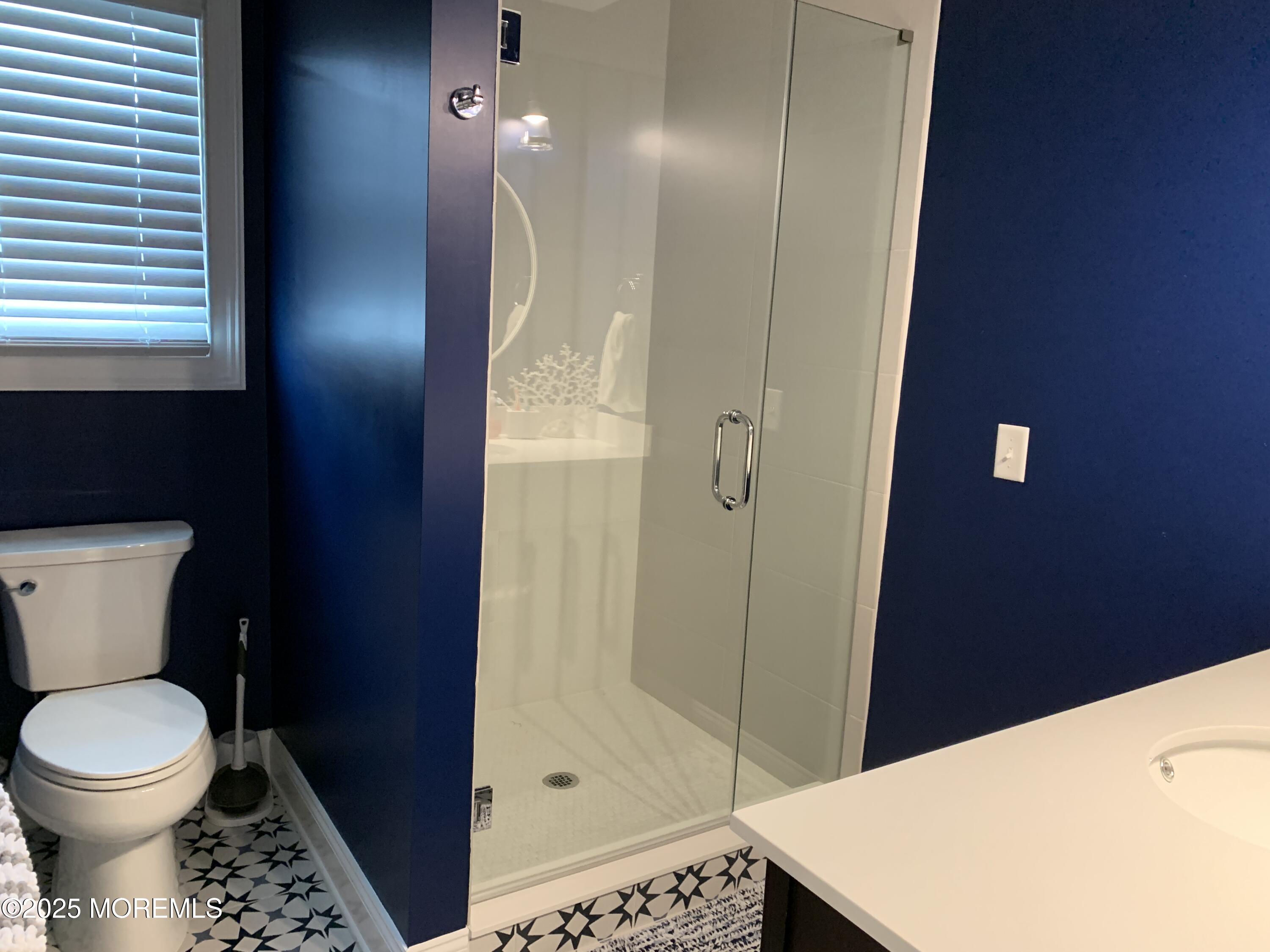 72 Spray Way Lavallette, NJ 08735 - Photo 8 of 14 a bathroom with a toilet and a shower