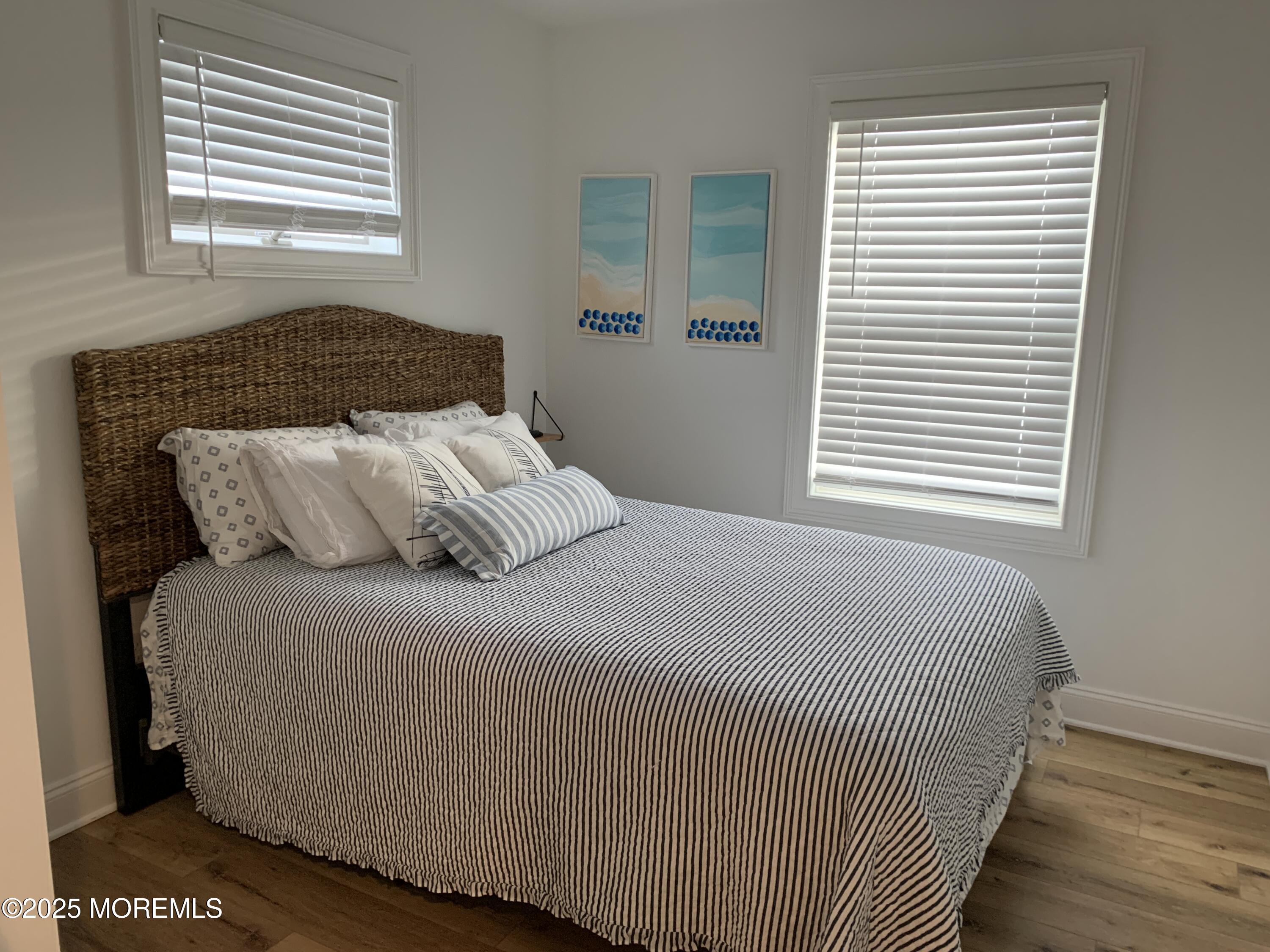 72 Spray Way Lavallette, NJ 08735 - Photo 10 of 14 a bedroom with a bed and a window