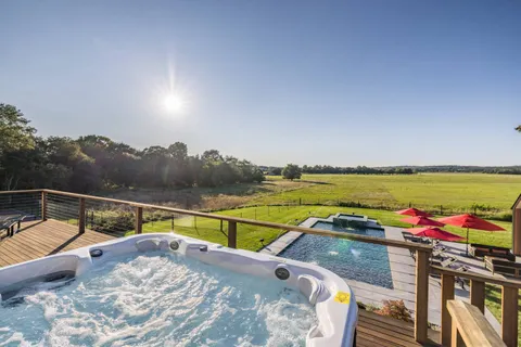 a view of a swimming pool with a terrace