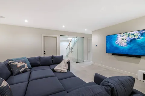 a living room with furniture and a couch