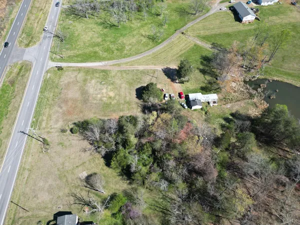 a view of a balcony with floor to ceiling windows