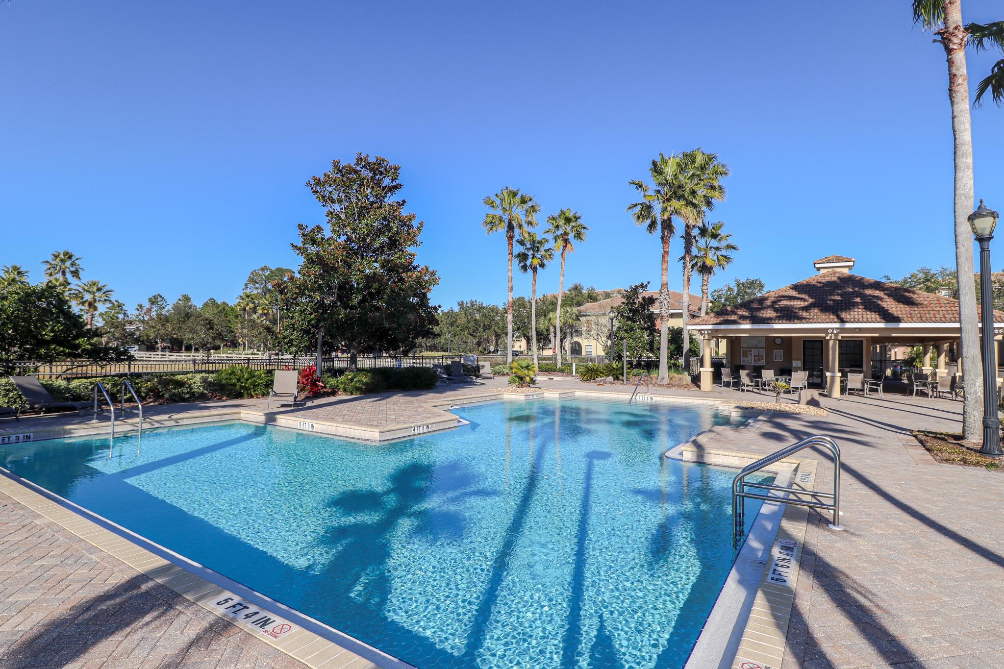 305 Via Castilla, Unit 103 St. Augustine, FL 32095 - Photo 28 of 34 a view of a swimming pool with an outdoor seating