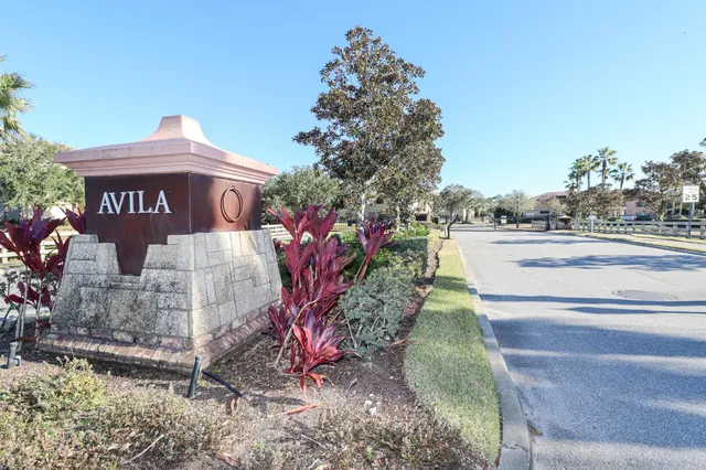 a view of a street in front of a house