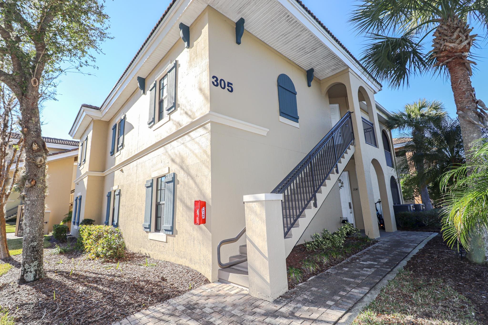 305 Via Castilla, Unit 103 St. Augustine, FL 32095 - Photo 32 of 34 a view of a house with a yard