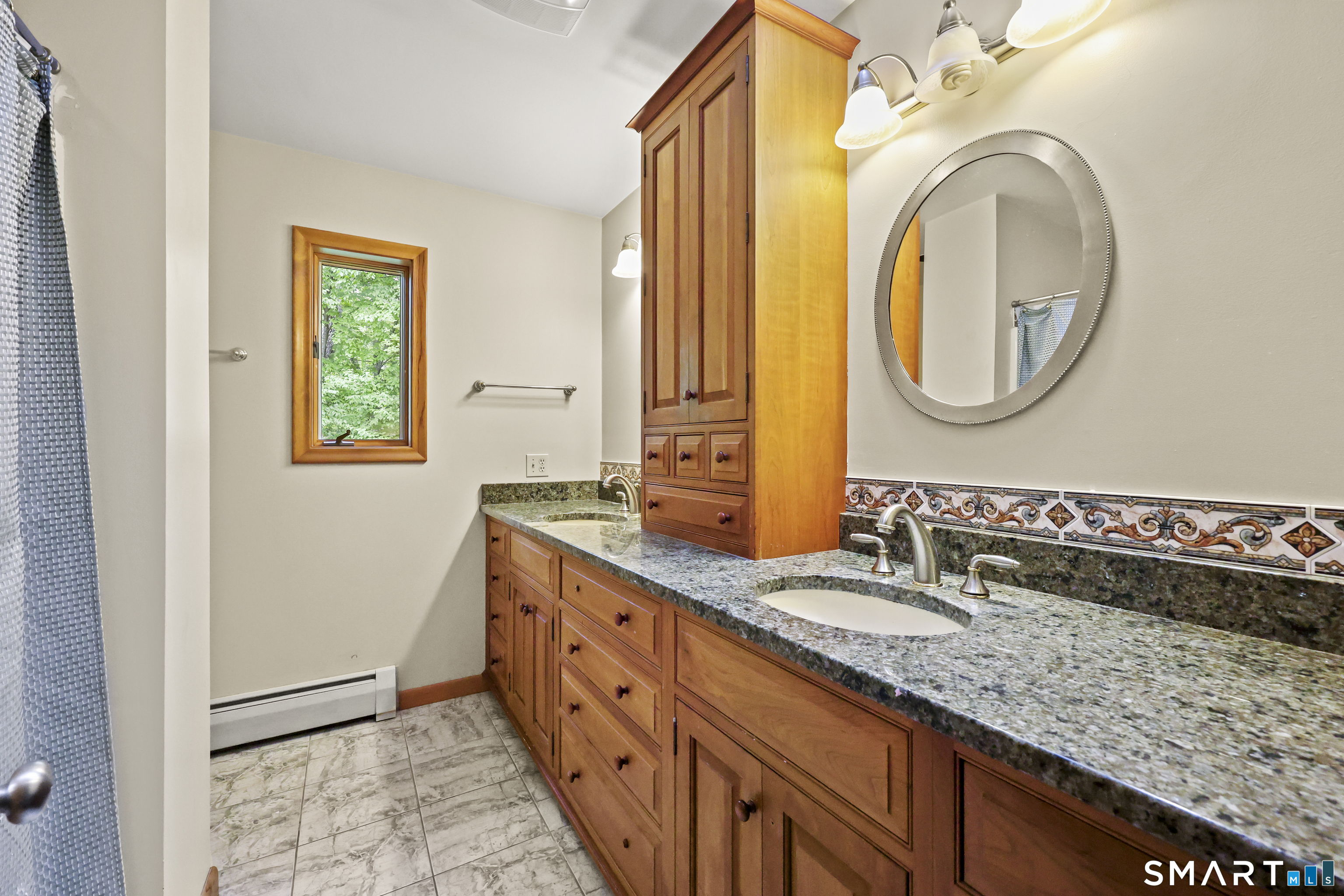 96 Spak Road Willington, CT 06279 - Photo 23 of 40 Primary Bathroom with granite-topped dual sink vanity.