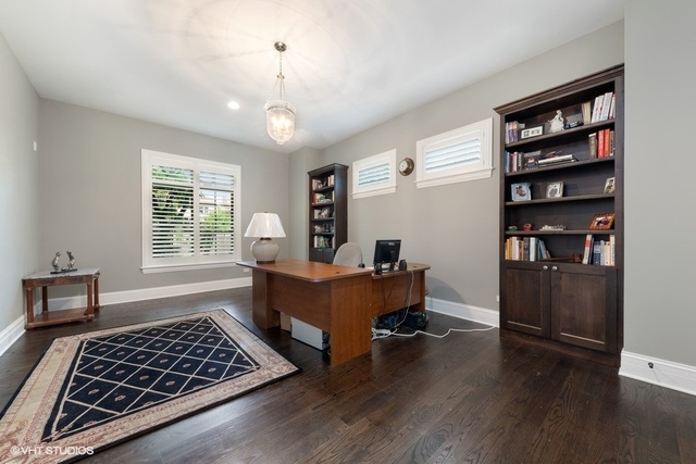 122 Walnut Street Elmhurst, IL 60126 - Photo 11 of 41 a living room with furniture and a window