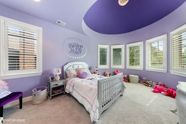 122 Walnut Street Elmhurst, IL 60126 - Photo 21 of 41 a bedroom with a bed and a window