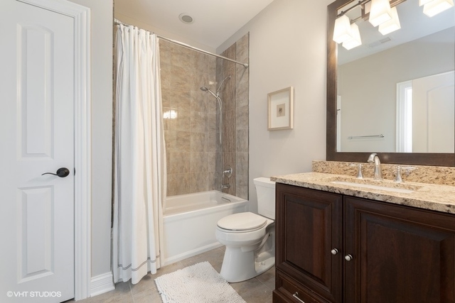 122 Walnut Street Elmhurst, IL 60126 - Photo 26 of 41 a bathroom with a granite countertop sink toilet and shower