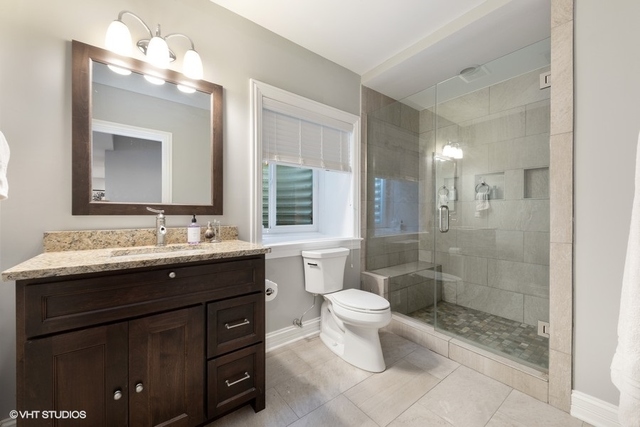 122 Walnut Street Elmhurst, IL 60126 - Photo 37 of 41 a bathroom with a double vanity sink mirror and toilet