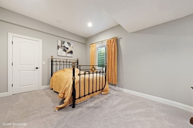 122 Walnut Street Elmhurst, IL 60126 - Photo 39 of 41 a bed room with a bed and a window