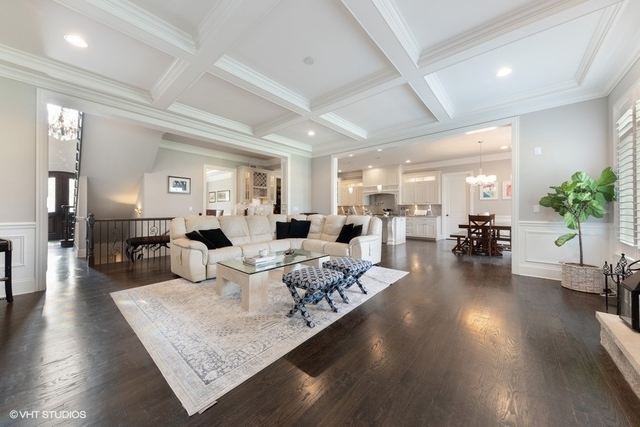 122 Walnut Street Elmhurst, IL 60126 - Photo 5 of 41 a living room with furniture wooden floor and a table