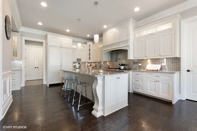 122 Walnut Street Elmhurst, IL 60126 - Photo 9 of 41 a kitchen with white cabinets and sink