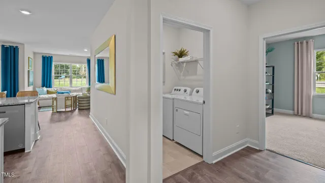 a view of kitchen with furniture and wooden floor
