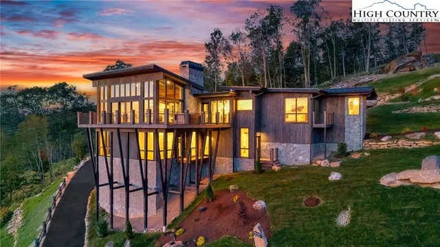 a view of a living room and a fireplace