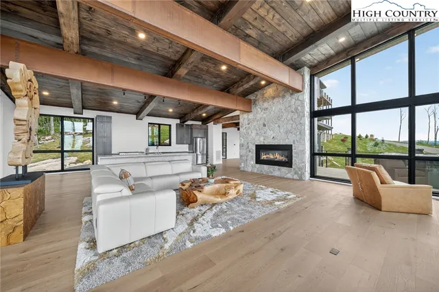 a bathroom with a bathtub and next to a window