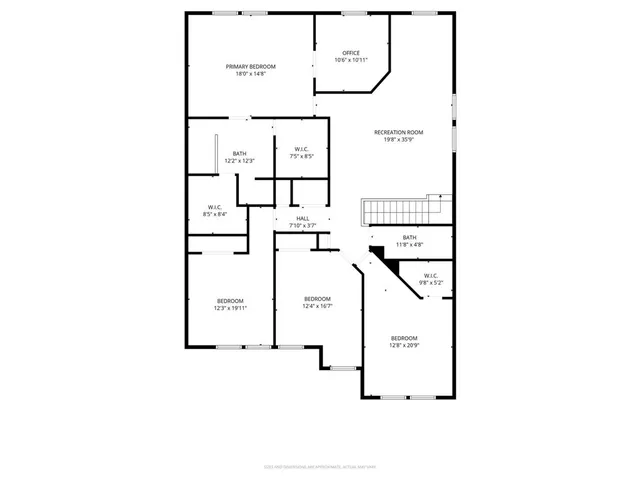 a living room with furniture a flat screen tv and a window