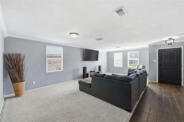 a living room with furniture and a couch