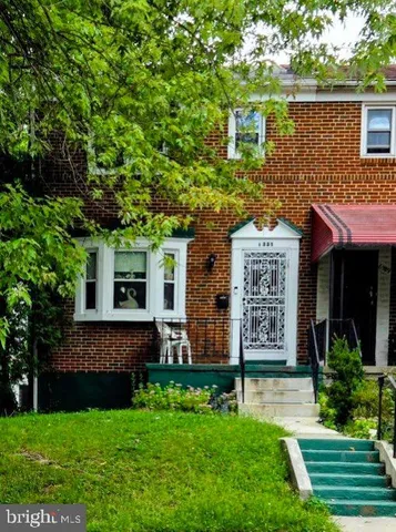 a view of a house with a garden