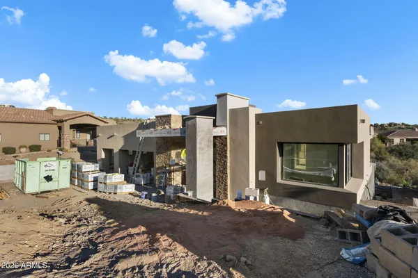 a living room with a couch and a view of living room
