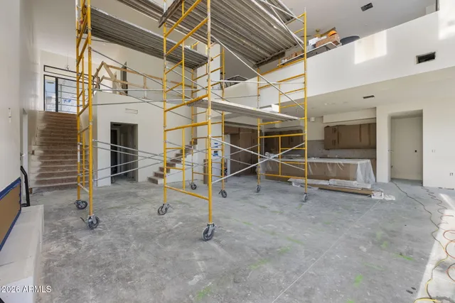 a view of an empty room with a balcony