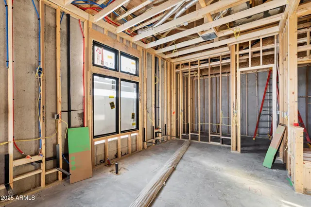 a view of a livingroom with furniture and a table