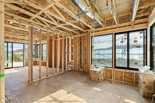 a view of a room with wooden walls