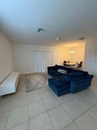 a room with a cabinet and a mirror