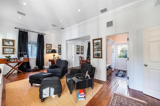 a bathroom with a sink and a window