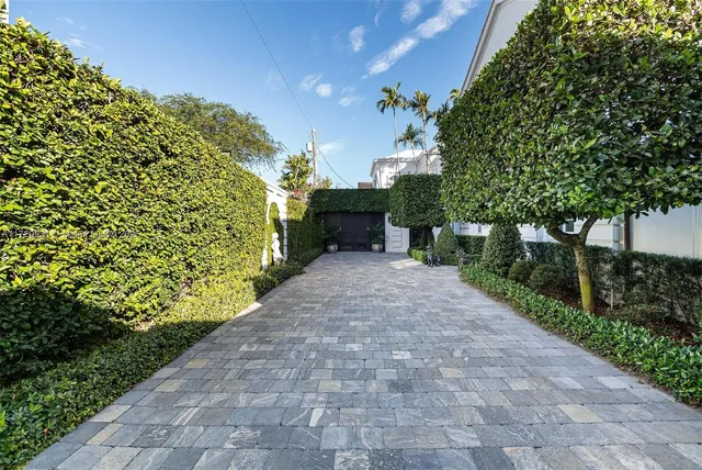a view of entryway livingroom and hall with wooden floor