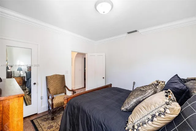 a view of a patio with a table and chairs