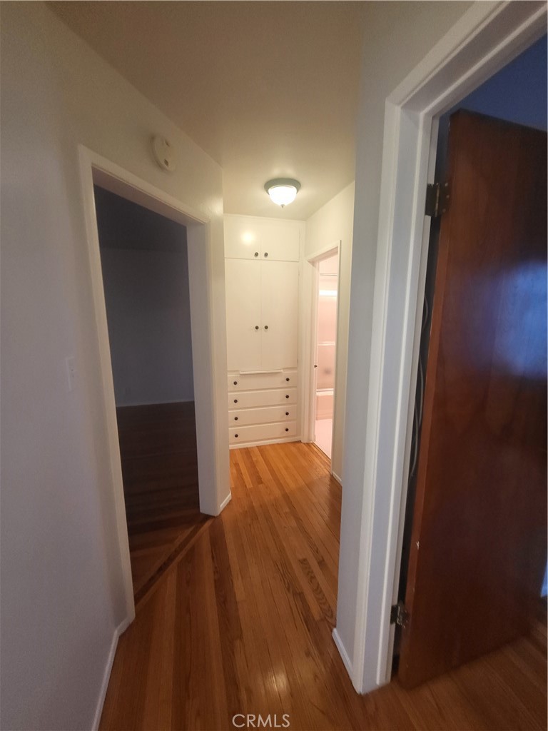 1057 East Appleton Street, Unit 7 Long Beach, CA 90802 - Photo 11 of 11 a view of hallway with wooden floor