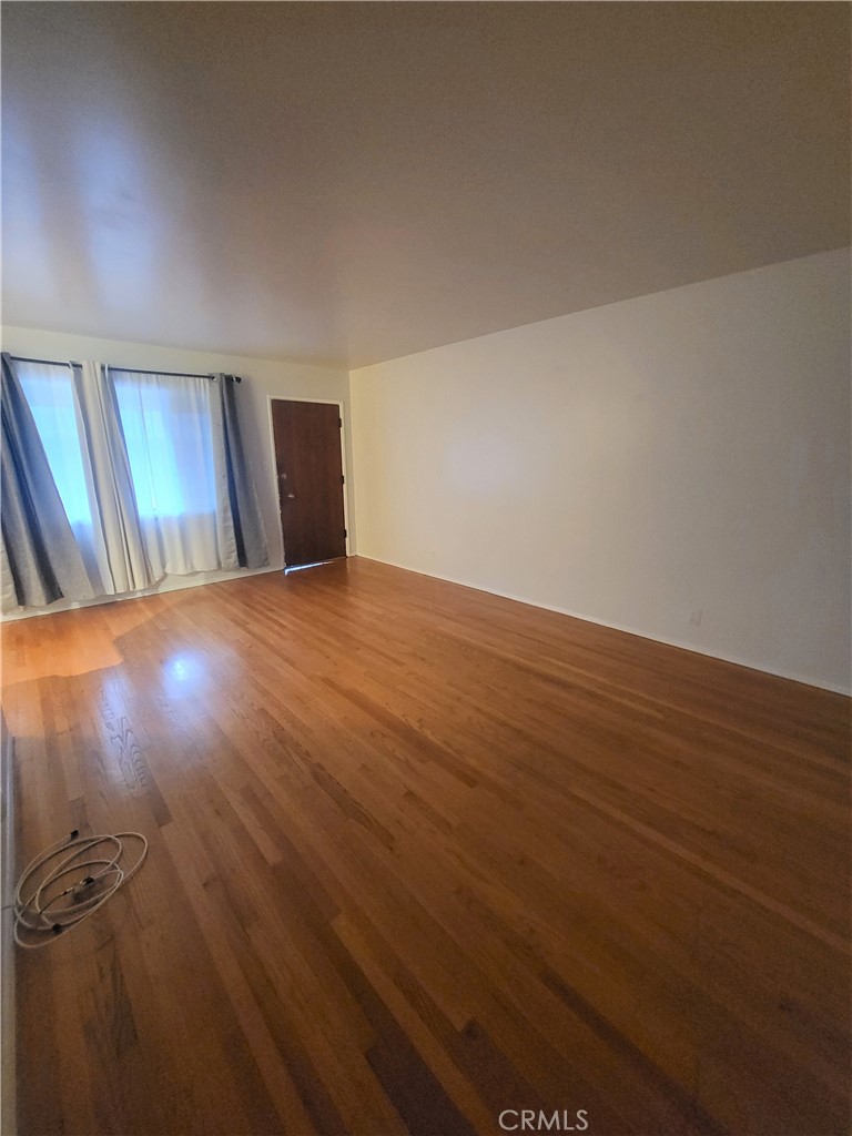 1057 East Appleton Street, Unit 7 Long Beach, CA 90802 - Photo 3 of 11 a view of an empty room and window