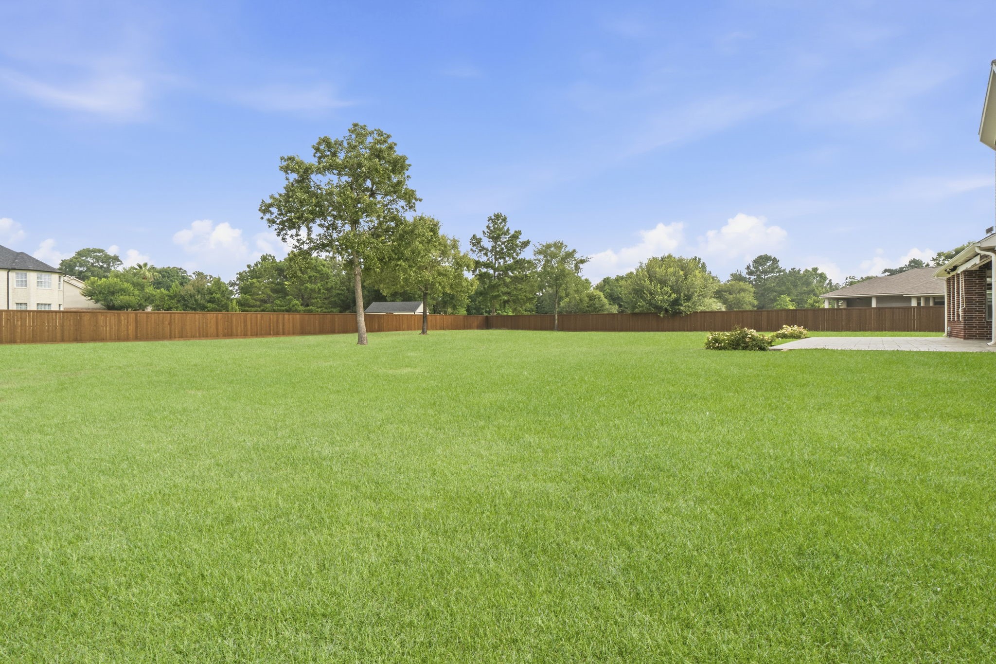 2716 Silverstone Way Conroe, TX 77304 - Photo 24 of 27 With leftover space for a garden, a trampoline, or whatever your heart desires.