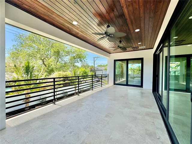 a spacious bathroom with a double vanity sink a mirror and a bathtub